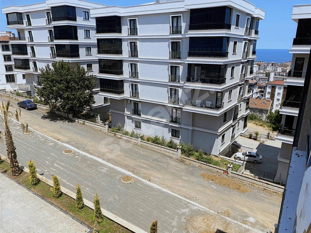 REMAX KUZEYDEN GÜL PARK 4TE DENİZ MANZARALI 1+1