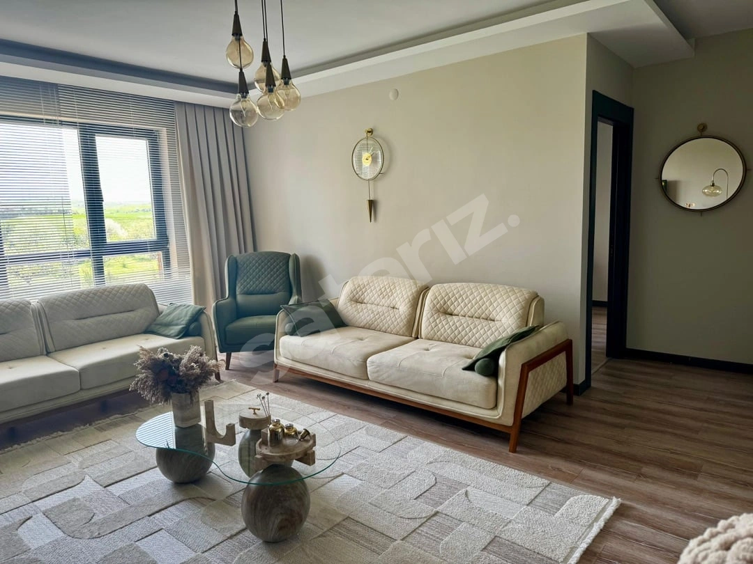 ALAÇATI'DAN İNCEK'TE GÜNEY CEPHE KAPALI OTOPARKLI GENİŞ LÜKS 4+1 PARK CEPHELİ