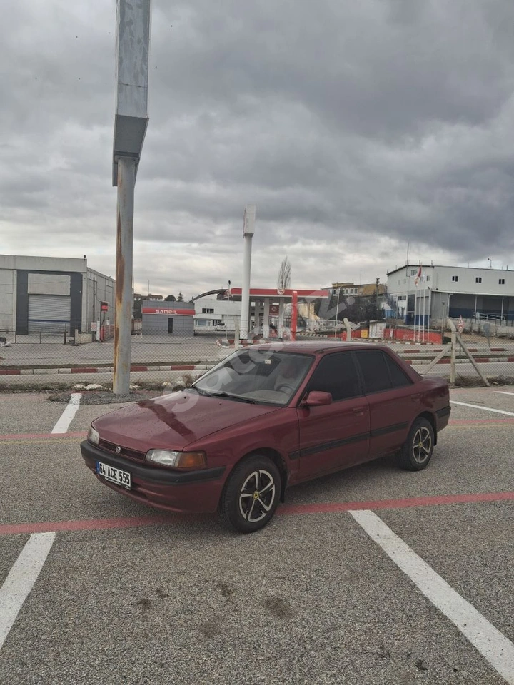 BORDO MAZDA 323