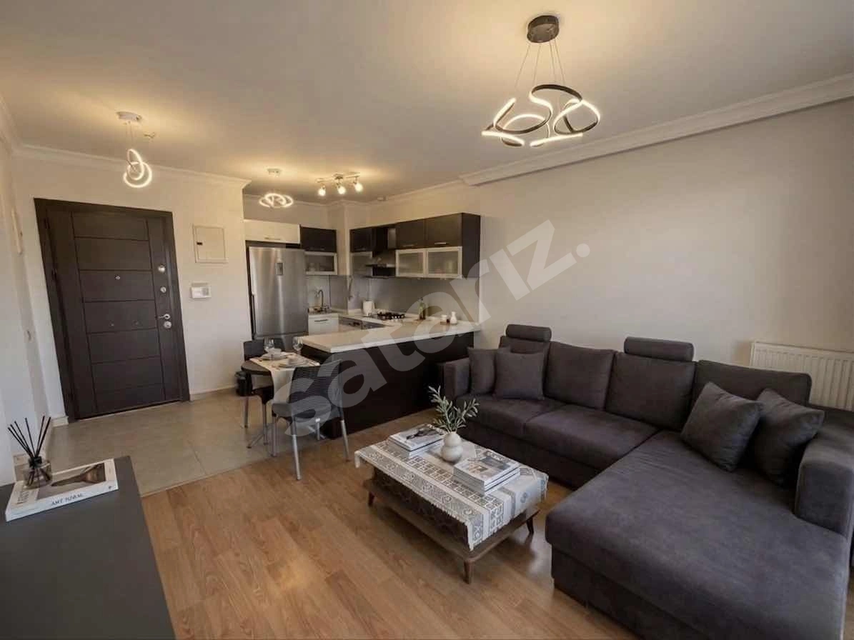 MAVİŞEHİR EMLAK KONUT'TA YÜKSEK KAT ÇİFT BALKON 1+1 SATILIK