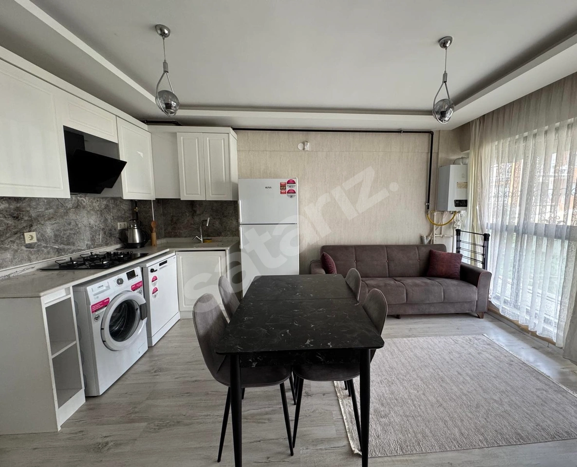İncek'te-İskanlı-Kiracılı ve Eşyalı-Satılık 1+1
