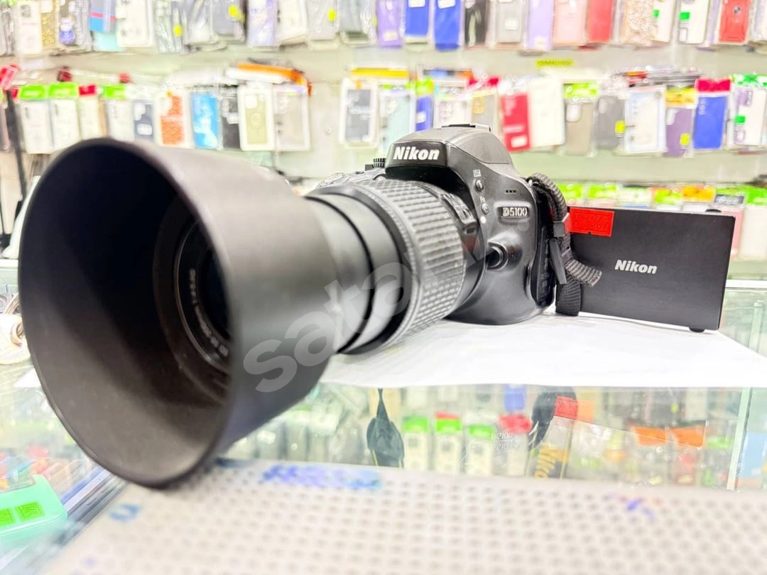 Nikon D5100 + 55-200mm Lens