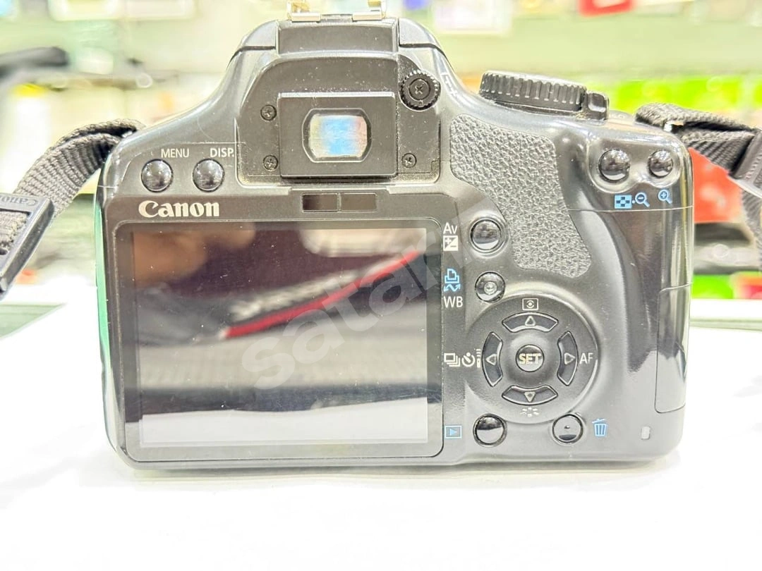 Canon EOS Rebel XSi (450D) + 18-55mm Lens