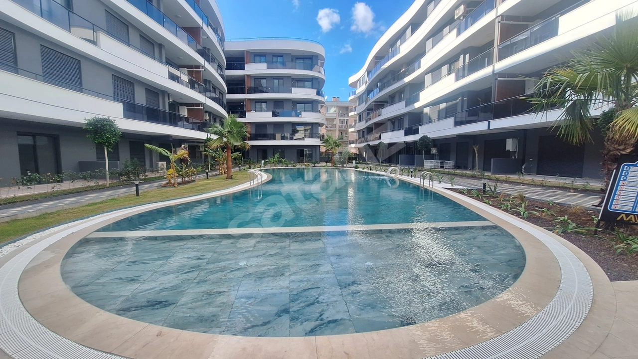 KUŞADASINDA KONFORLU TATİL KEYFİNDE SATILIK 2+1 DAİRE