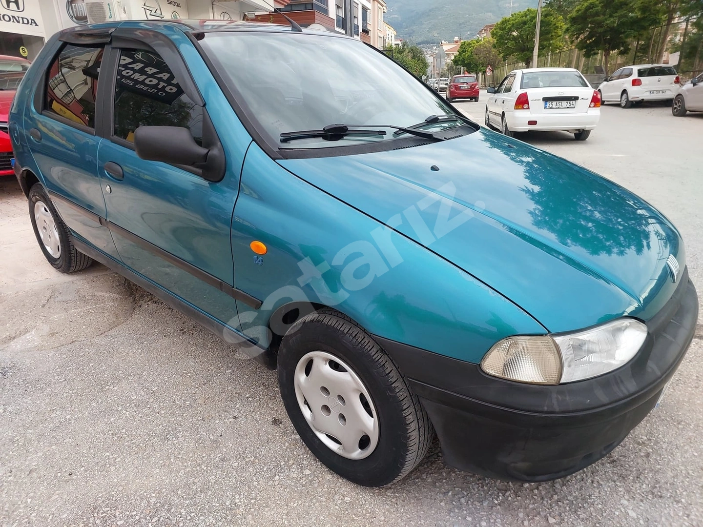 YAPAR OTOMOTİV'DEN DEĞİŞENSİZ 1999 FİAT PALİO 1.4 EL KLİMALI