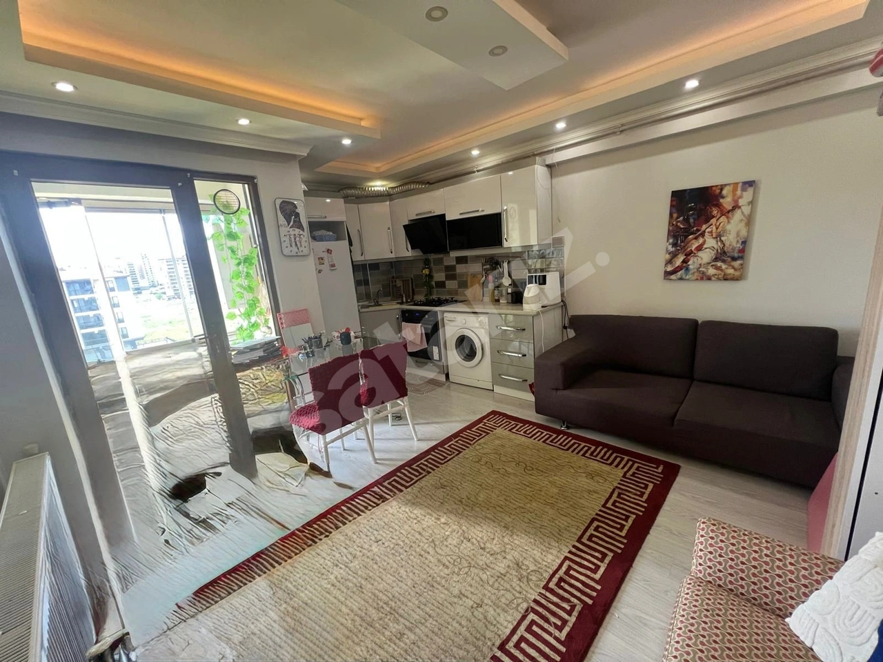 BÜLENT ECEVİT BUL. ÜZERİNDE 1+1 KİRACILI SATILIK DAİRE