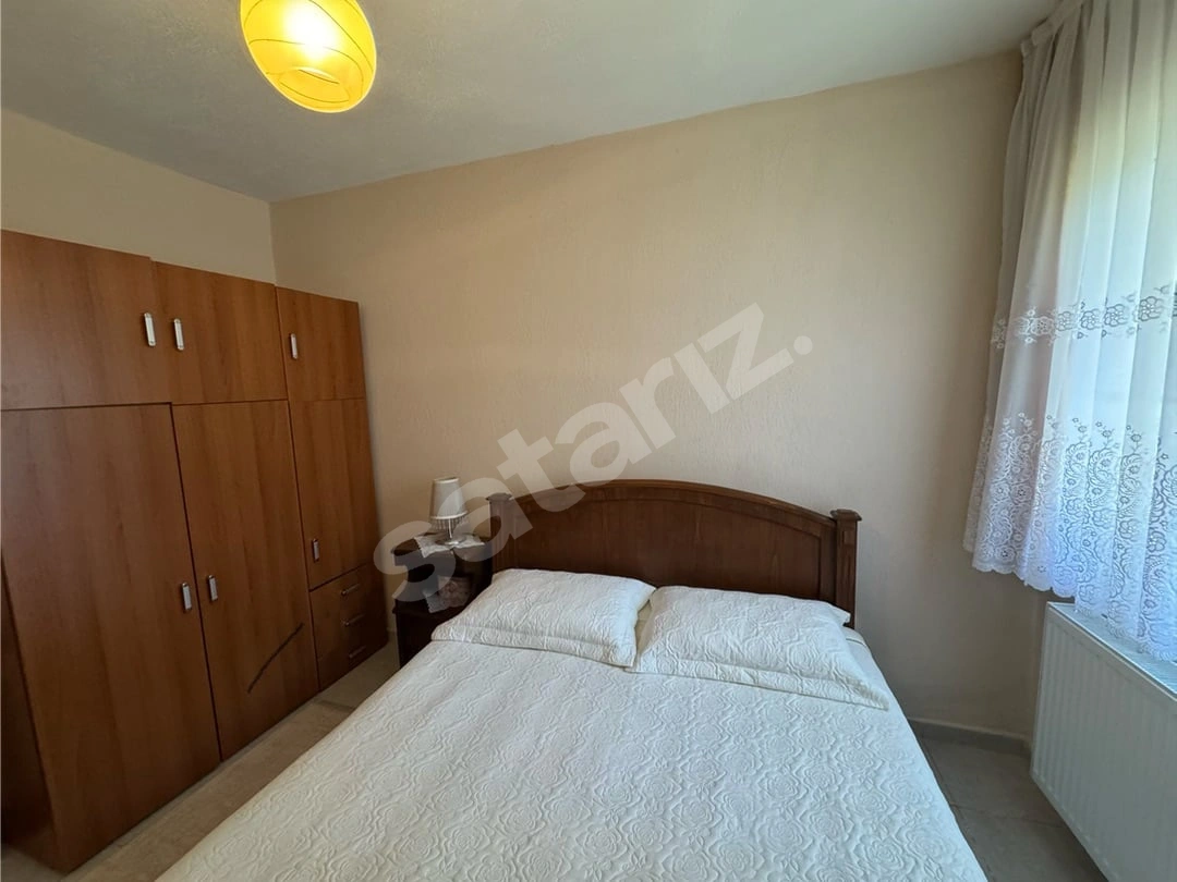 Kuşadası Güzelçamlı'da Satılık 2+1 Bahçeli Daire